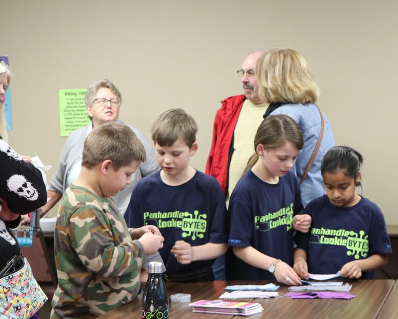 youth work on crafts together at 4-H event