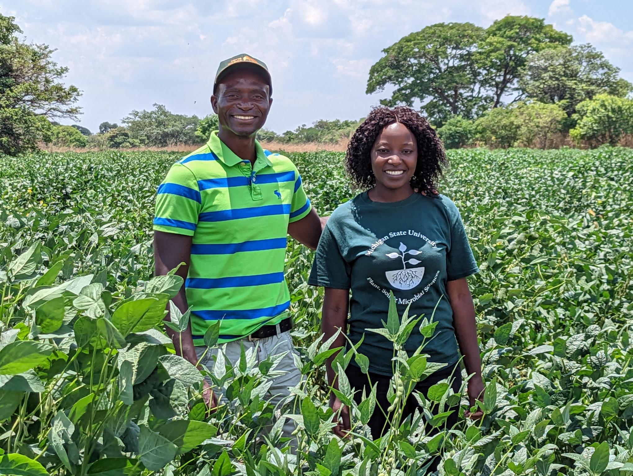 man and woman in field