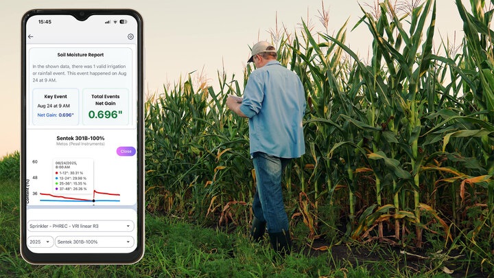 photo of cell phone screen with app overlaying on left hand side of cornfield where a man is walking looking at his phone