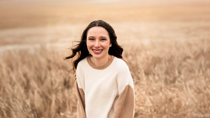 woman standing in field