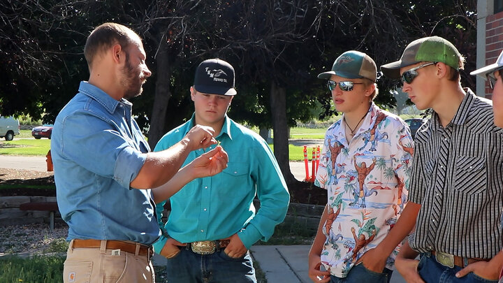 Man talks to youth about weed in his hand